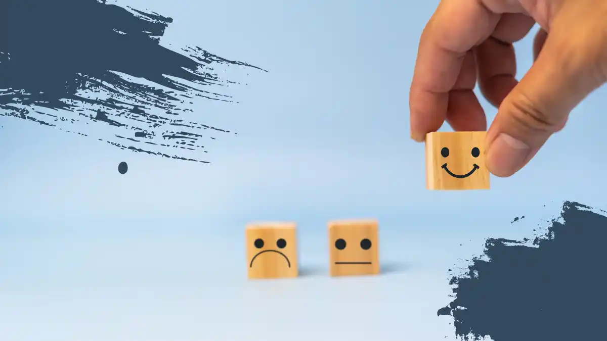 Online brand reputation management represented by wooden cubes with facial expressions, symbolizing customer perception.