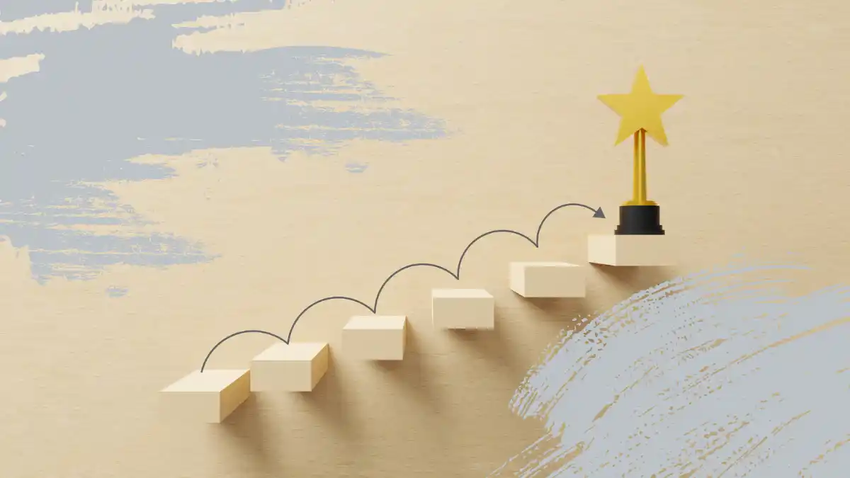 A staircase of white blocks leading to a golden star trophy, representing steps to enhance brand recognition through PR and digital marketing.